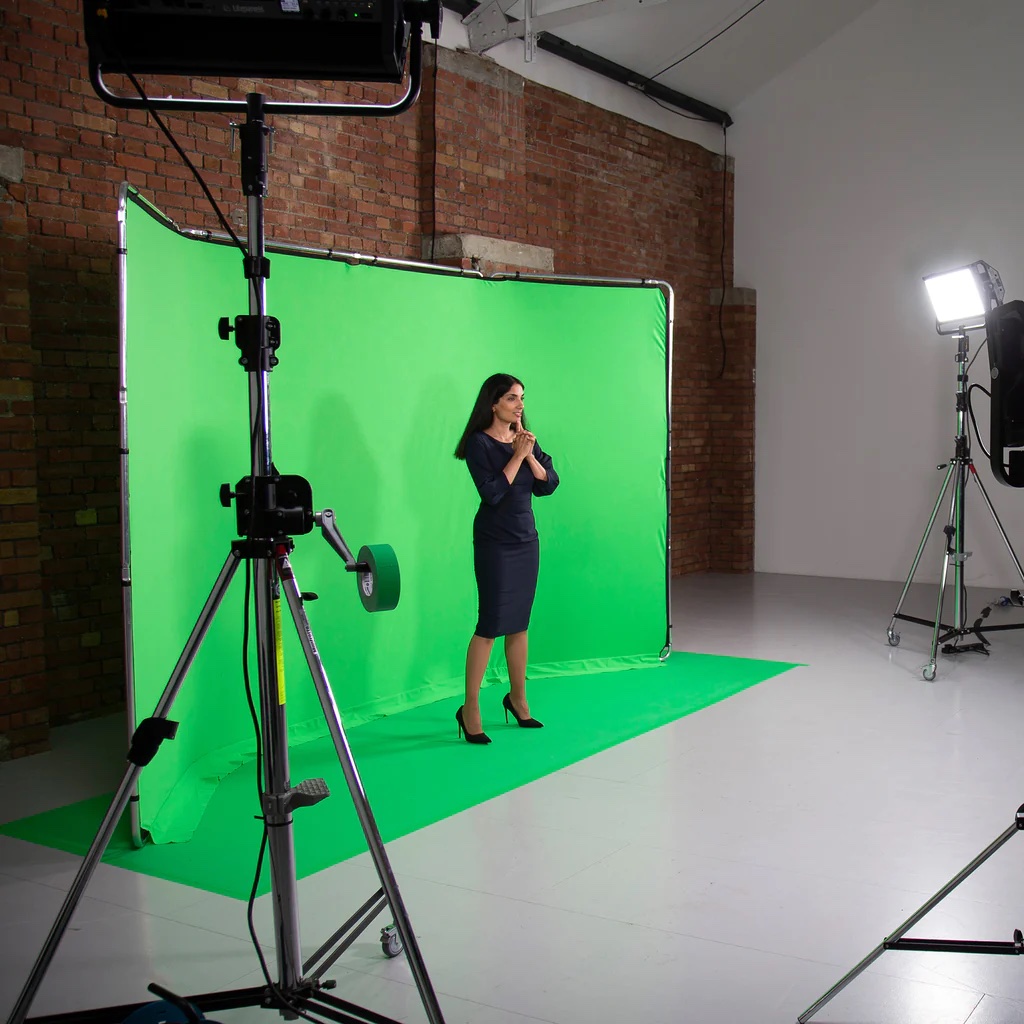 wide green screen with floor and model showing actual size